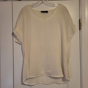 Semi sheer cream blouse